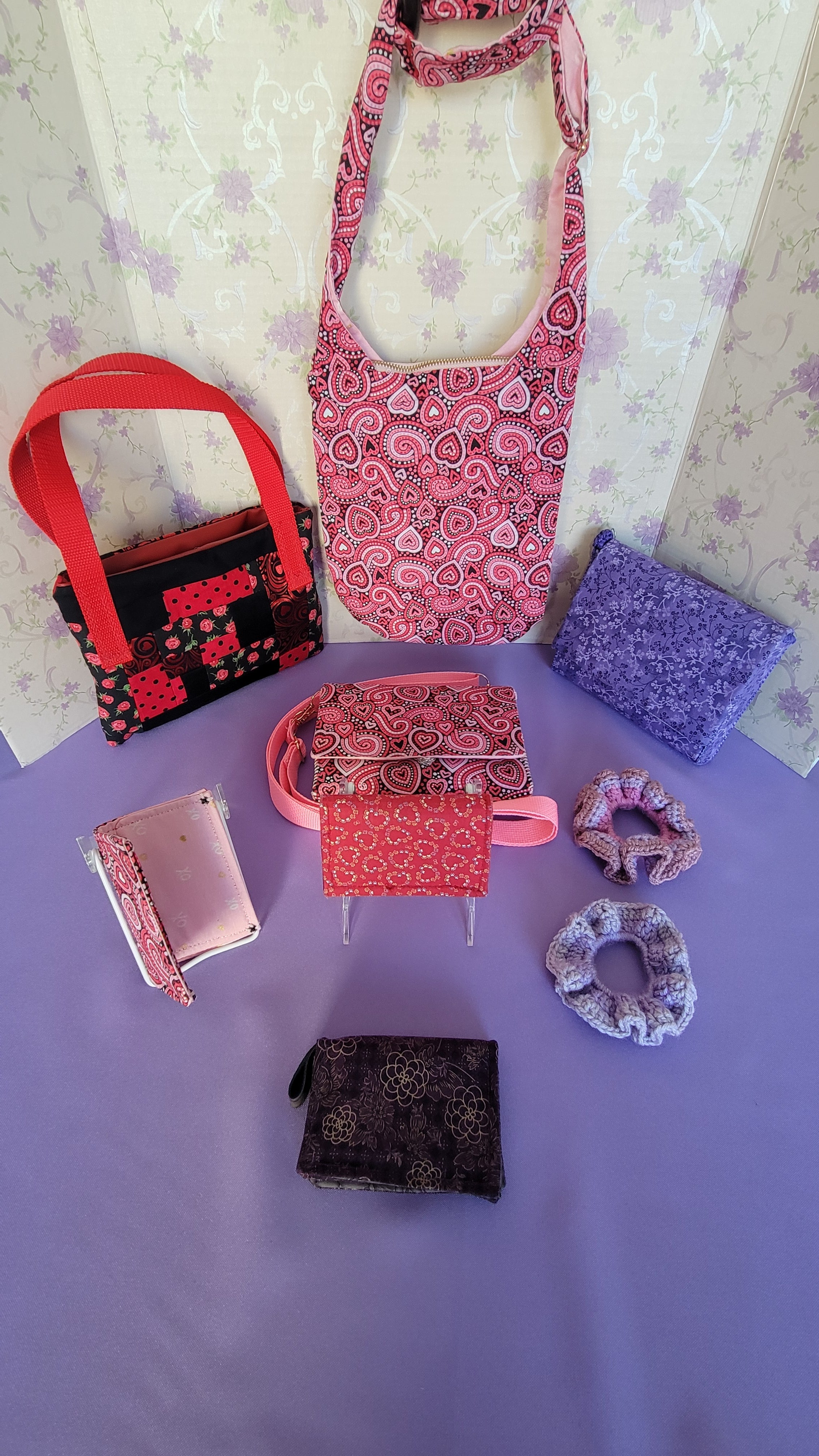 This is the Valentine's Day line. This includes three Angelicas, three flores purses, four wallets, two tracy toe bags and two scrunchies.