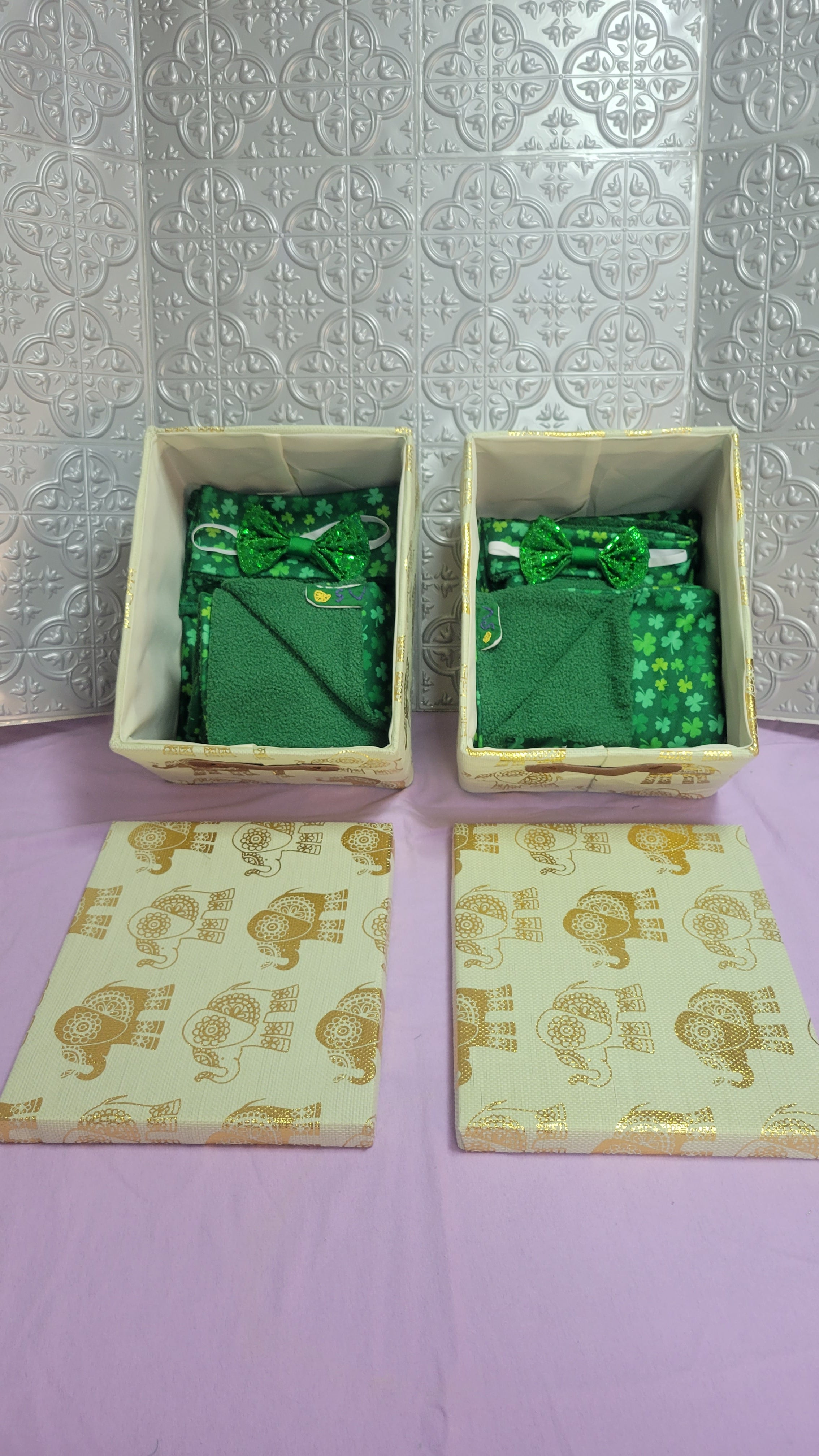 Two St Patrick's Blankets in gold elephant gift box. 