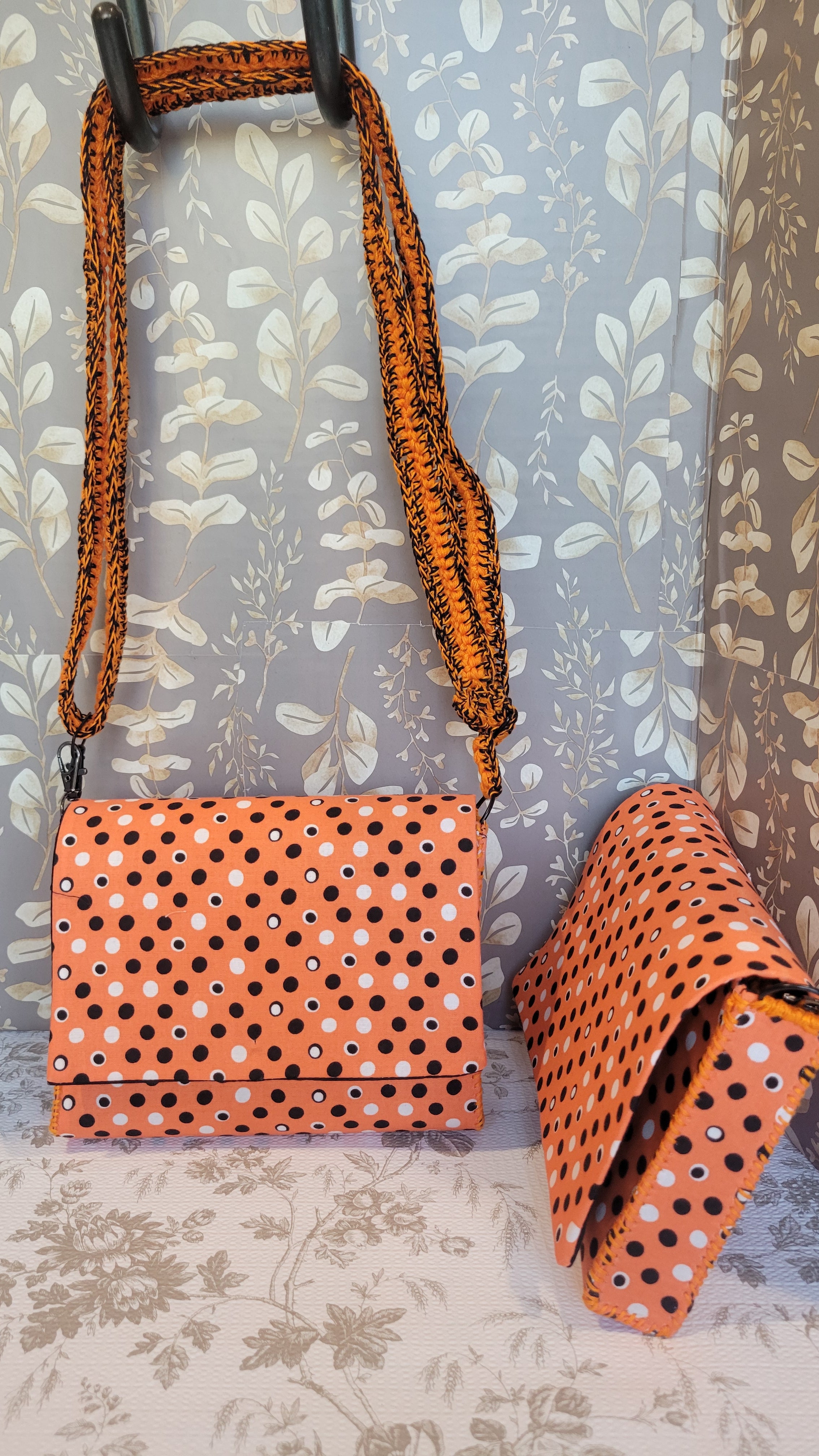 Black and White Polkadots on Orange Background in The Flores Style