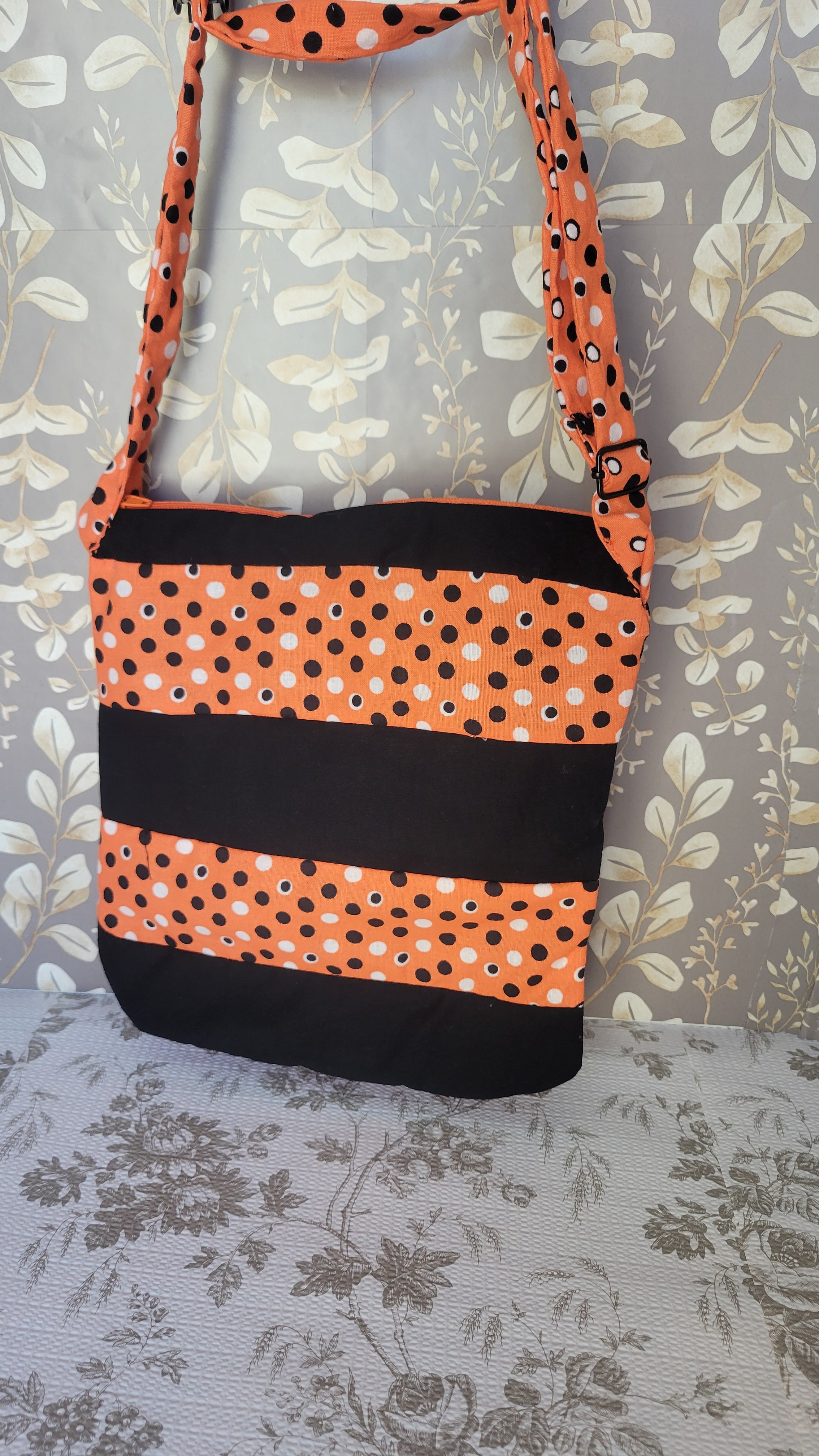Black and White Polkadots in Orange Background in Quilted Angelica Style