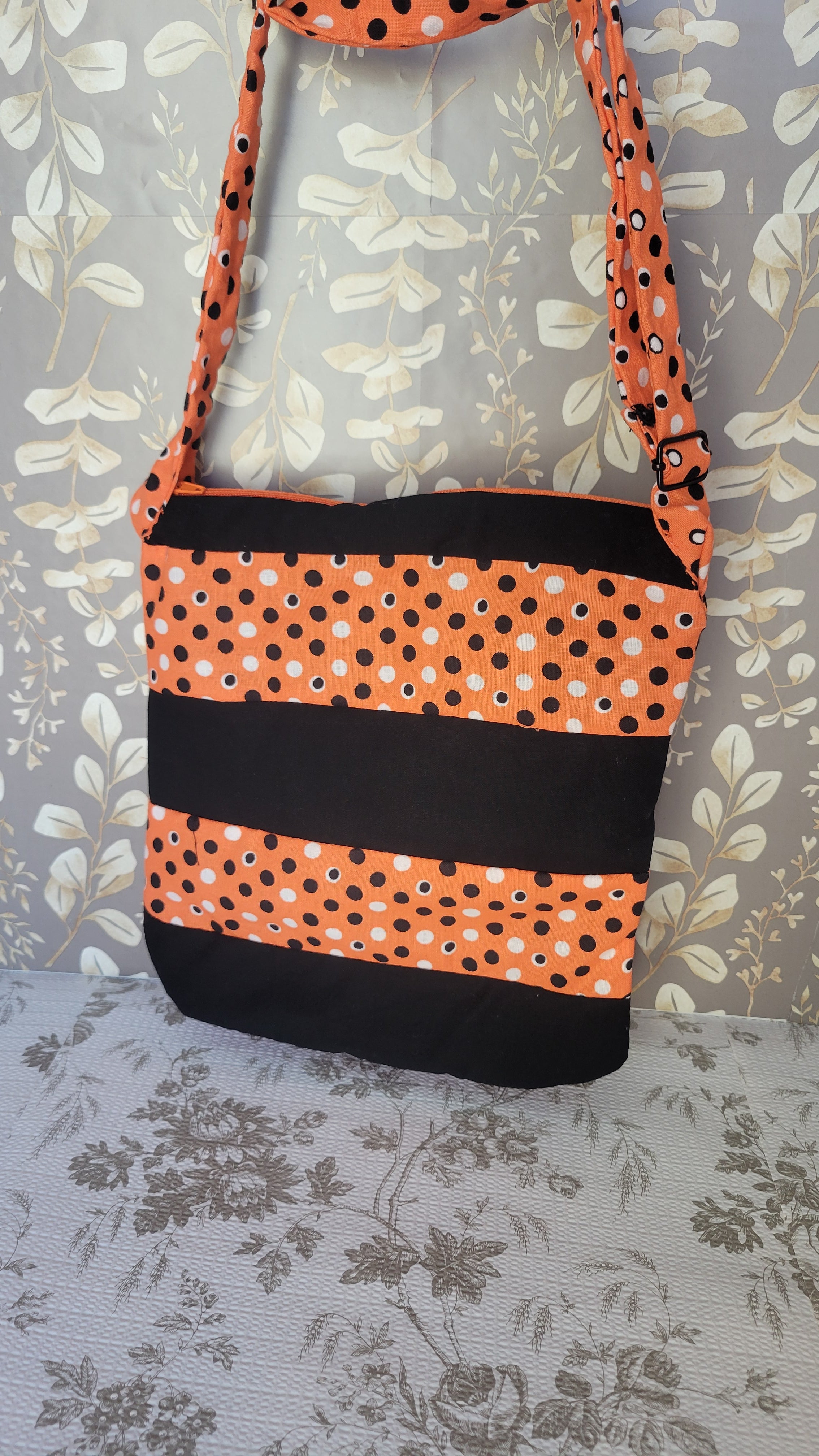 Black and White Polkadots in Orange Background in Quilted Angelica Style