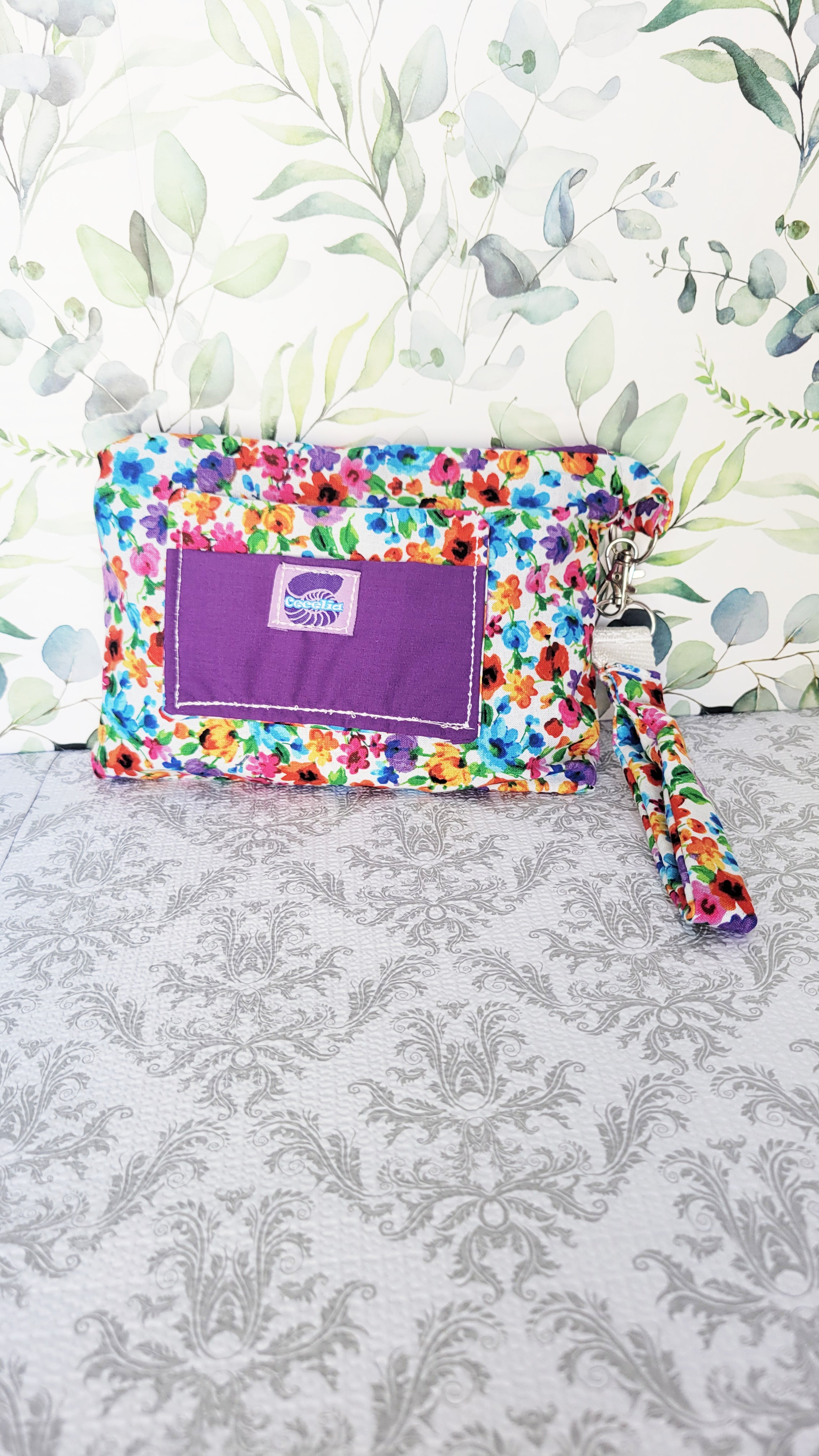 Watercolor Wild flowers in the Conchita purse with Purple Pockets