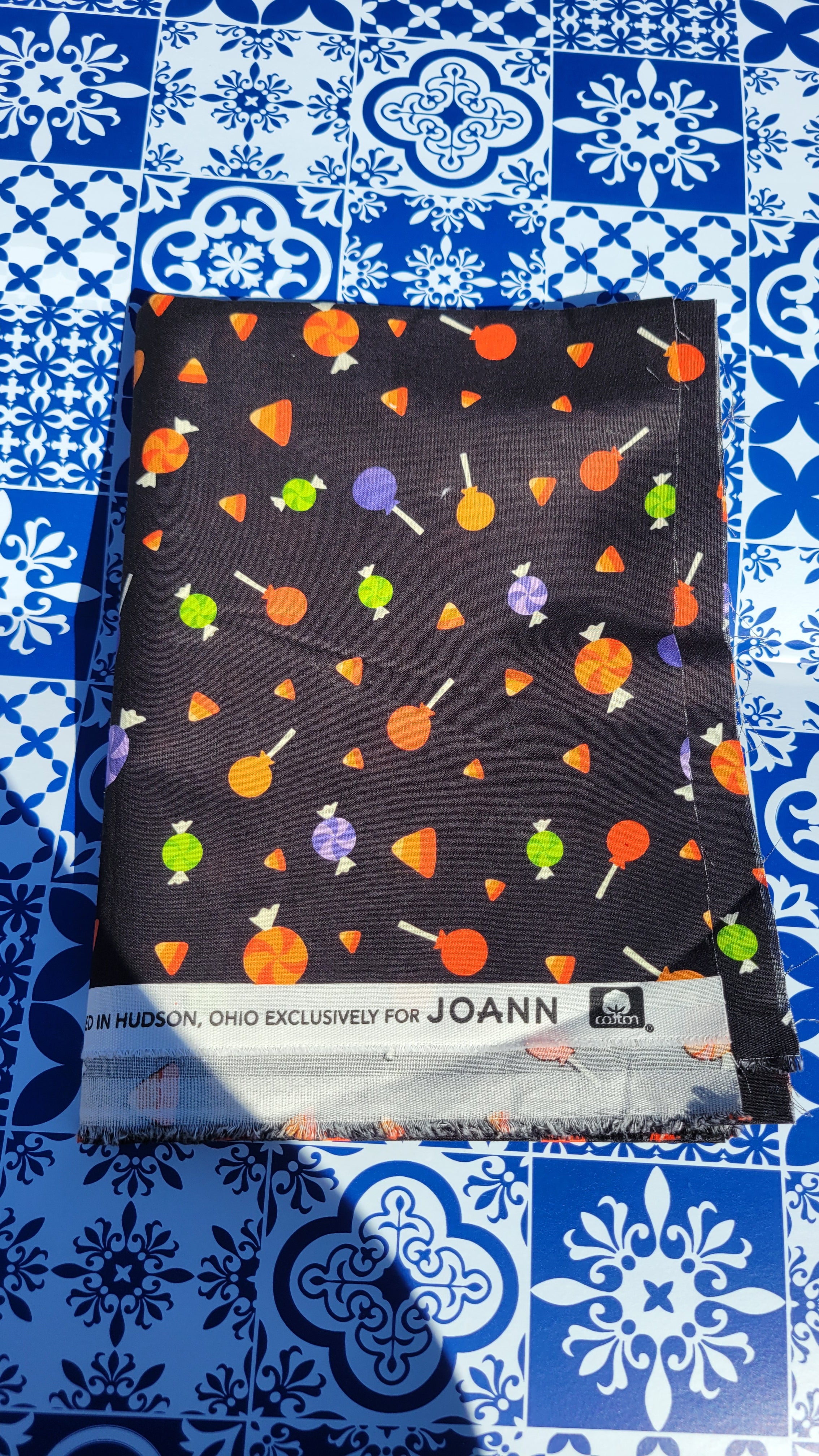 Mix Halloween Candy on Black Fabric