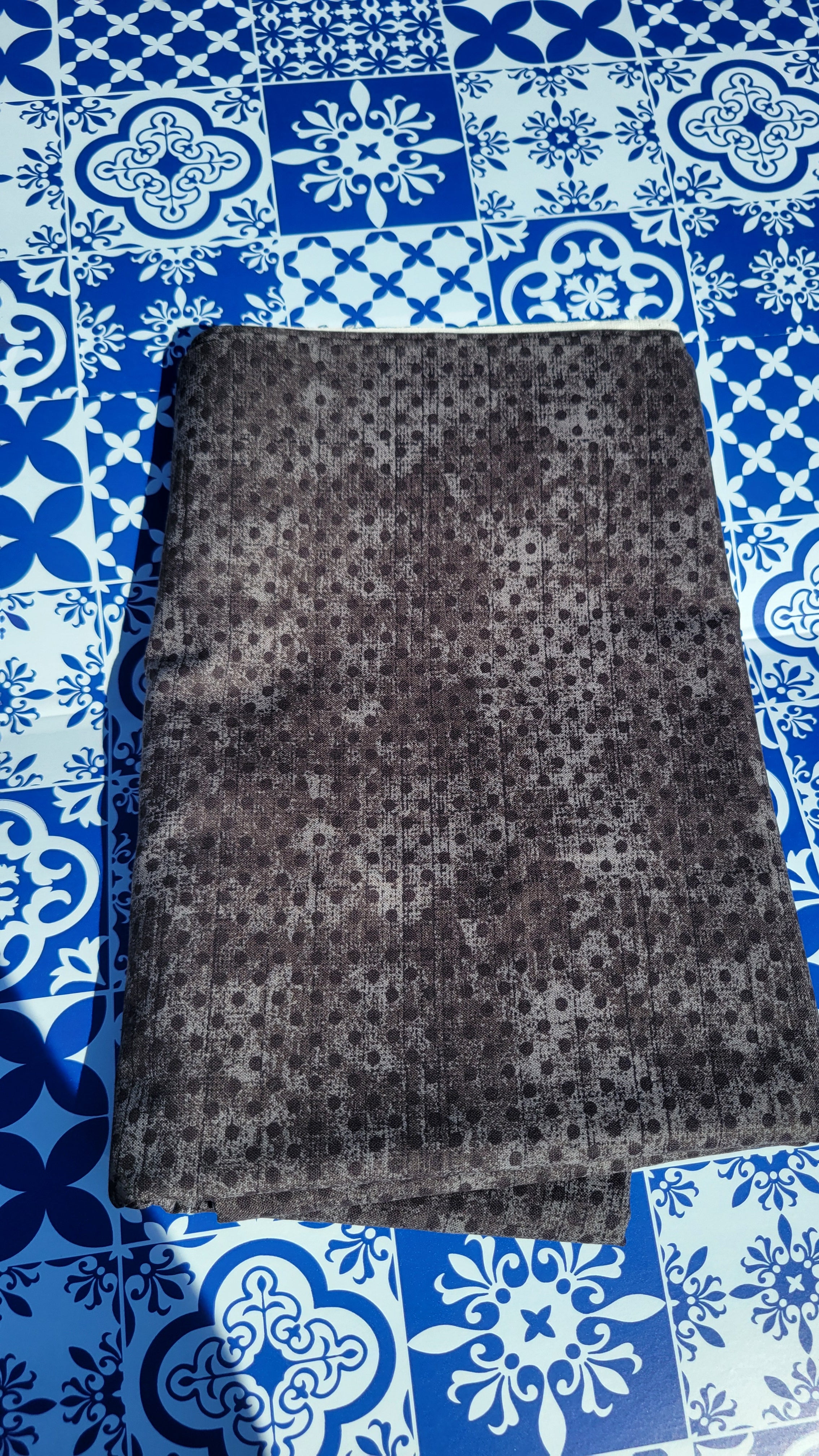 Black polka dot pattern on a mixture of Black and Charcoal Gray Fabric