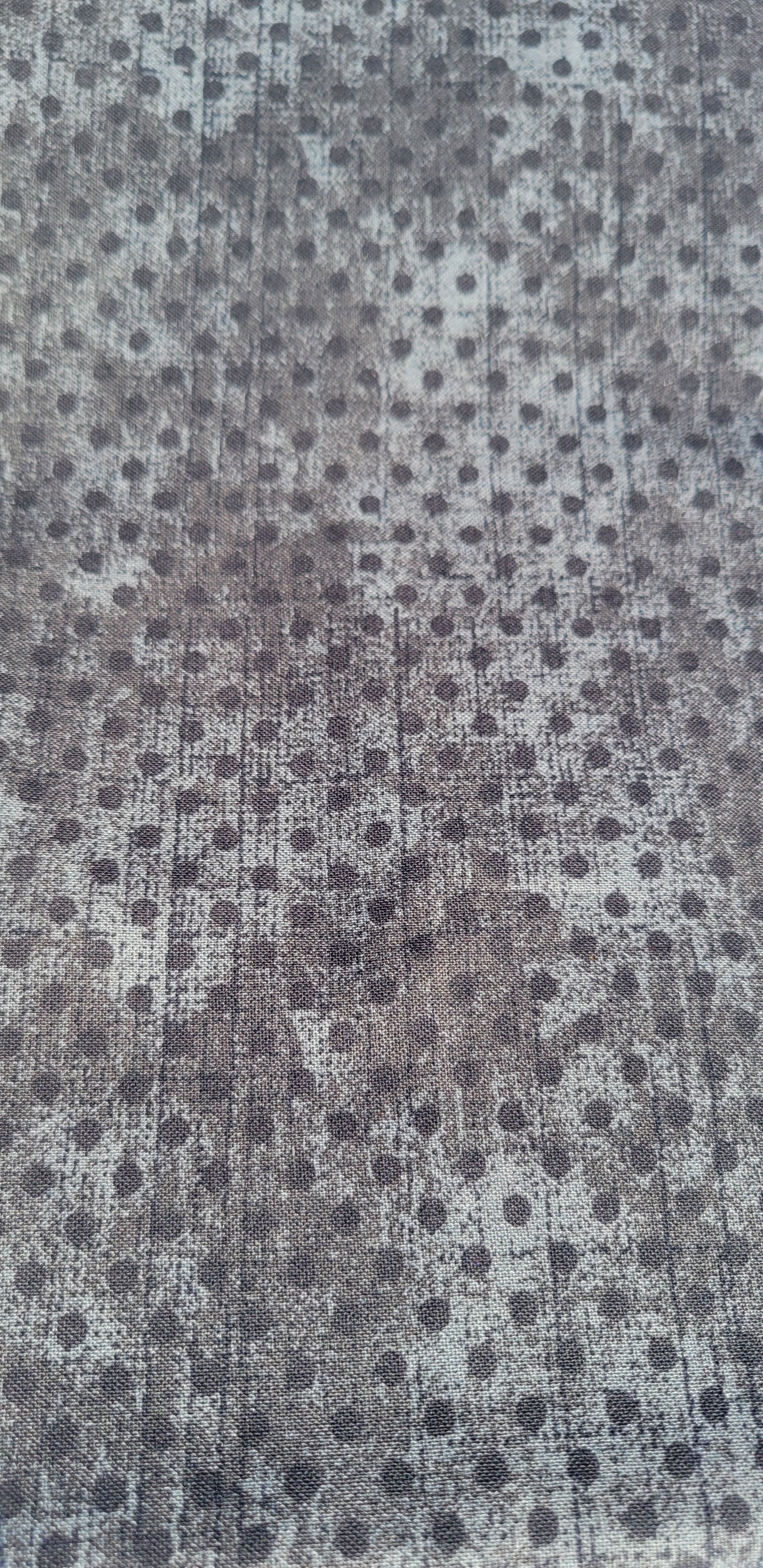 Black polka dot pattern on a mixture of Black and Charcoal Gray Fabric