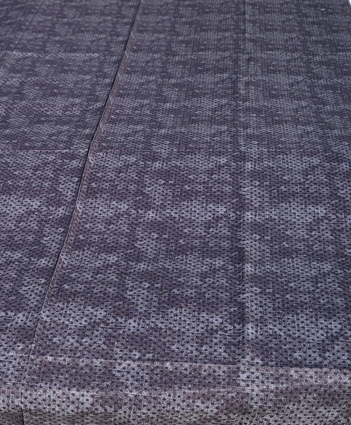 Black polka dot pattern on a mixture of Black and Charcoal Gray Fabric